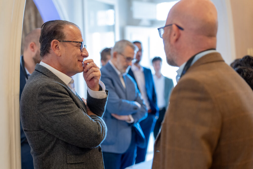 Guests in conversation between sessions.