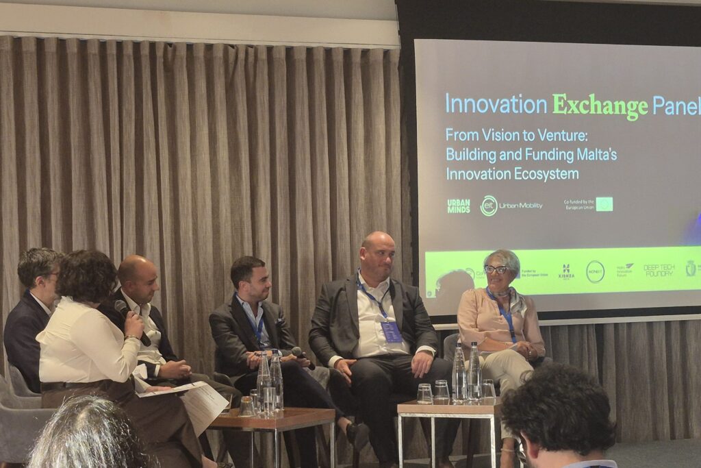 A closer view of the panel during the discussion.